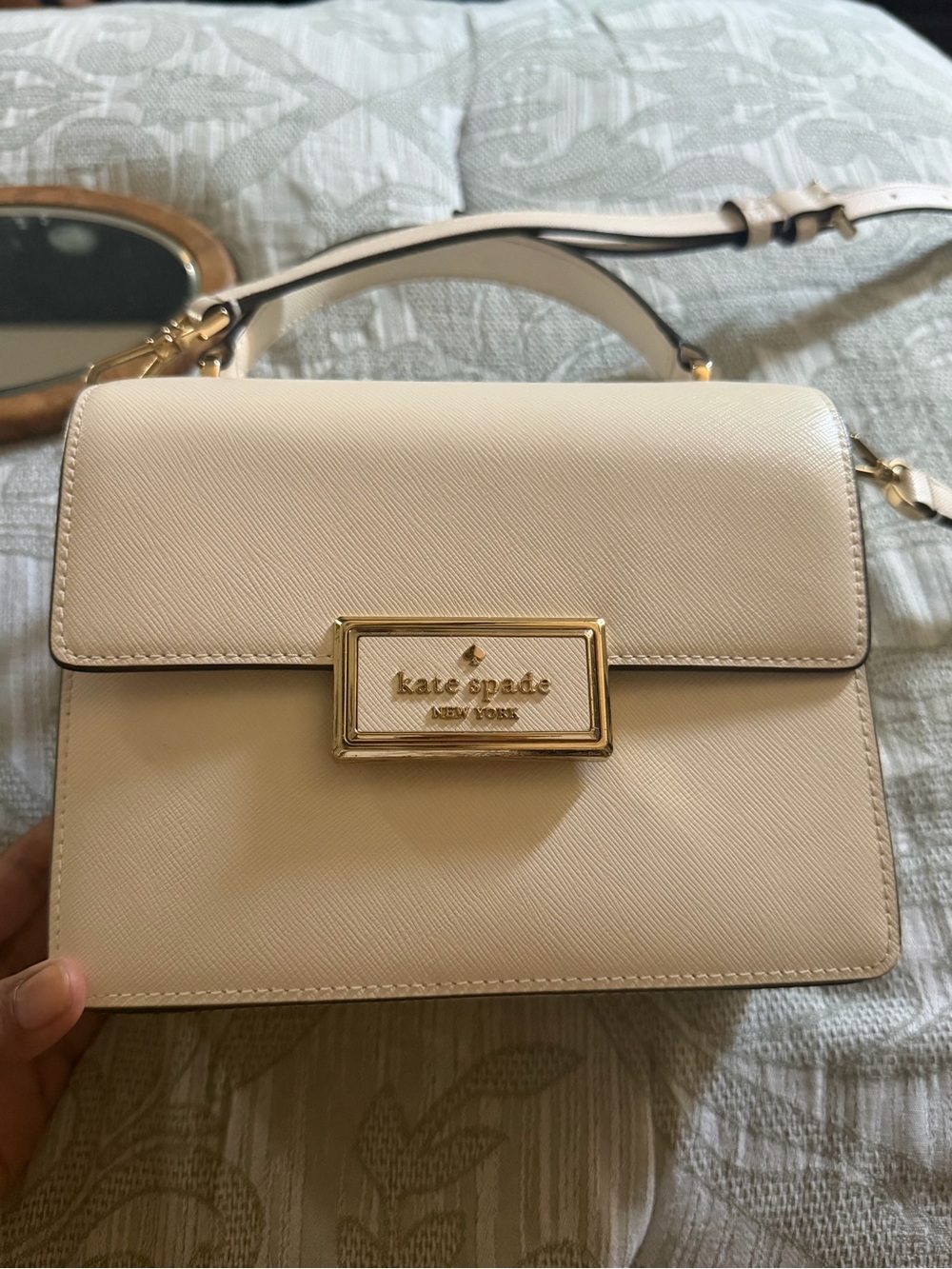kate spade cream leather top-handle satchel with gold plaque